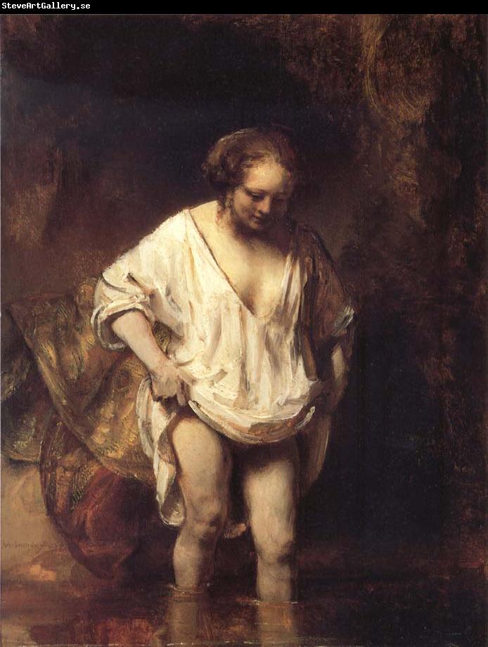 REMBRANDT Harmenszoon van Rijn Hendrickje Bathing in a River